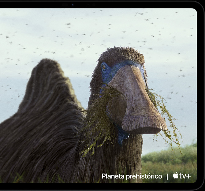 Vista horizontal del iPad Pro que muestra una escena de «Planeta prehistórico» reproduciéndose