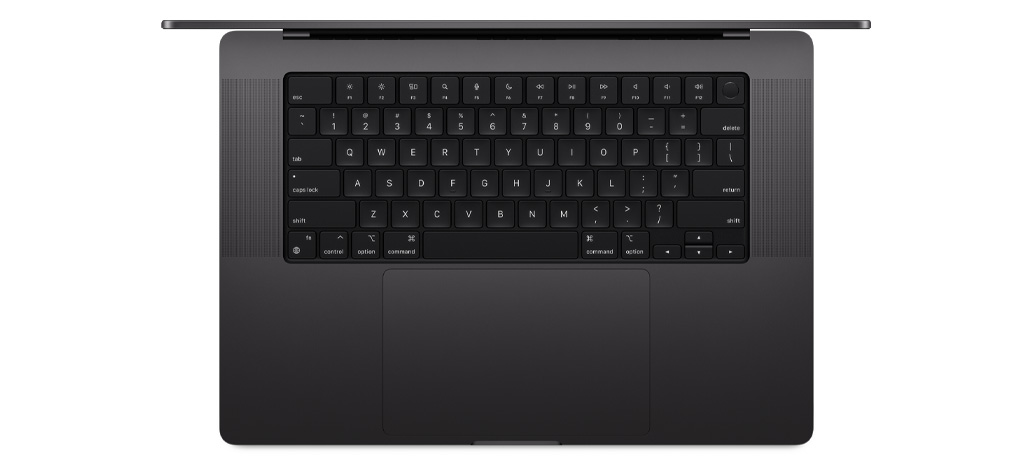 Skatā no augšas redzams MacBook Pro ar iebūvētu Magic Keyboard, kurai ir Touch ID un skārienpaliktnis